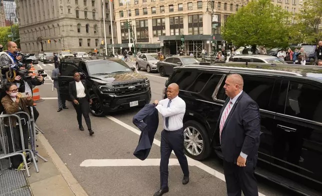 New York City Mayor Eric Adams, second from right, arrives to court in New York, Wednesday, Oct. 2, 2024. (AP Photo/Seth Wenig)