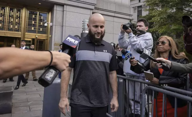 Mohamed Bahi, New York City Mayor's liaison to the Muslim community exits Manhattan Federal Court, Tuesday, Oct. 8, 2024, in New York. (AP Photo/Yuki Iwamura)