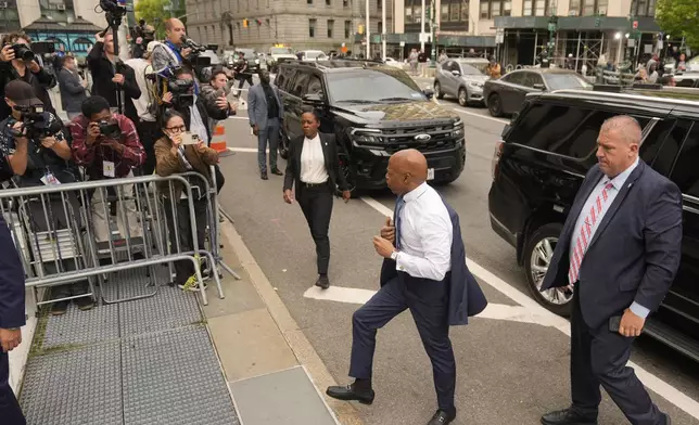 New York City Mayor Eric Adams, second from right, arrives to court in New York, Wednesday, Oct. 2, 2024. (AP Photo/Seth Wenig)