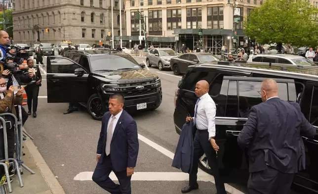 New York City Mayor Eric Adams, second from right, arrives to court in New York, Wednesday, Oct. 2, 2024. (AP Photo/Seth Wenig)