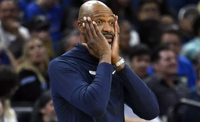 Orlando Magic head coach Jamahl Mosley reacts after getting called for a technical foul during the second half of an NBA basketball game against the Brooklyn Nets, Friday, Oct. 25, 2024, in Orlando, Fla. (AP Photo/Phelan M. Ebenhack)