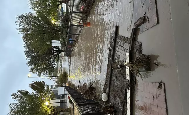 This image provided by Tom Hudgens shows damage caused by flooding in Roswell, N.M., Monday, Oct. 21, 2024. (Tom Hudgens via AP)