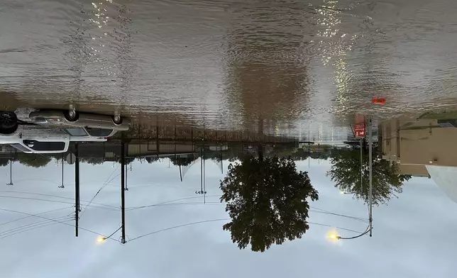 This image provided by Tom Hudgens shows flooding in Roswell, N.M., Monday, Oct. 21, 2024. (Tom Hudgens via AP)