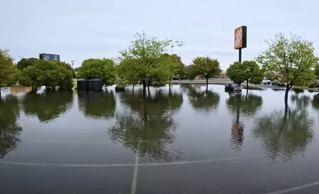 In this image taken from video, debris and damage and are seen from severe flooding in Roswell, N.M., Sunday, Oct. 20, 2024. (Juliana Halvorson via AP)