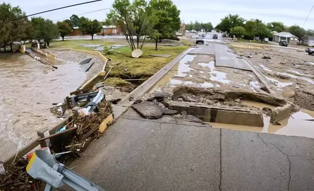 In this image taken from video, debris and damage and are seen from severe flooding in Roswell, N.M., Sunday, Oct. 20, 2024. (Juliana Halvorson via AP)