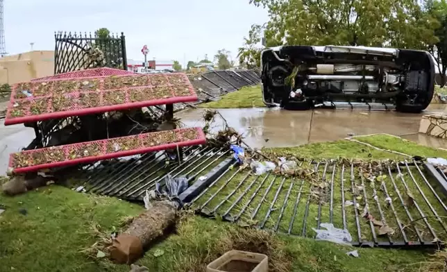 In this image taken from video, debris and damage and are seen from severe flooding in Roswell, N.M., Sunday, Oct. 20, 2024. (Juliana Halvorson via AP)