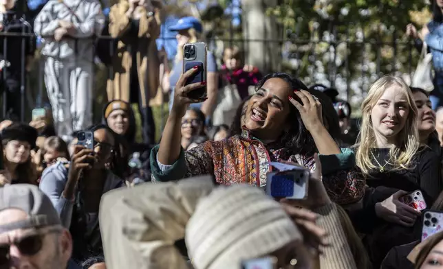 Crowds look on at the Timothee Chalamet lookalike contest near Washington Square Park, Sunday, Oct. 27, 2024, in New York. (AP Photo/Stefan Jeremiah)