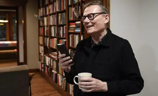 Nobel prize winner in Economics, James A. Robinson, gives an interview to the Associated Press from his home in the Hyde Park neighborhood of Chicago, Monday, Oct. 14, 2024. (AP Photo/Charles Rex Arbogast)