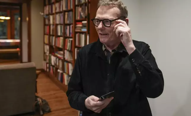 Nobel prize winner in Economics, James A. Robinson, gives an interview to the Associated Press from his home in the Hyde Park neighborhood of Chicago, Monday, Oct. 14, 2024. (AP Photo/Charles Rex Arbogast)