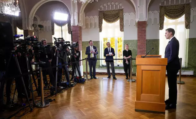 The head of the Nobel Committee, Jorgen Watne Frydnes, announces at a press conference that the Japanese organization Nihon Hidankyo is the winner of the Nobel Peace Prize for 2024 at the Nobel Institute in Oslo, Norway, Friday, Oct. 11, 2024. (Javad Parsa/NTB Scanpix via AP)