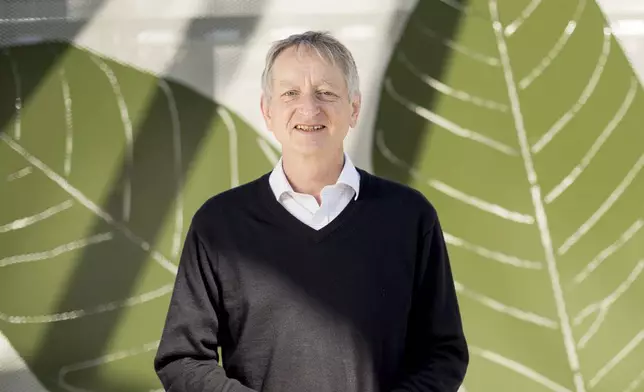 File - Computer scientist Geoffrey Hinton poses at Google's Mountain View, Calif, headquarters on Wednesday, March 25, 2015. (AP Photo/Noah Berger, File)