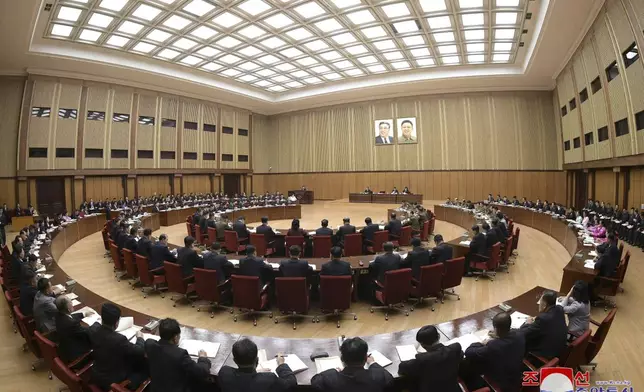 In this photo provided Wednesday, Oct. 9, 2024, by the North Korean government, assembly members attend the Supreme People’s Assembly at the Mansudae Assembly Hall in Pyongyang, North Korea. Independent journalists were not given access to cover the event depicted in this image distributed by the North Korean government. The content of this image is as provided and cannot be independently verified. Korean language watermark on image as provided by source reads: "KCNA" which is the abbreviation for Korean Central News Agency. (Korean Central News Agency/Korea News Service via AP)