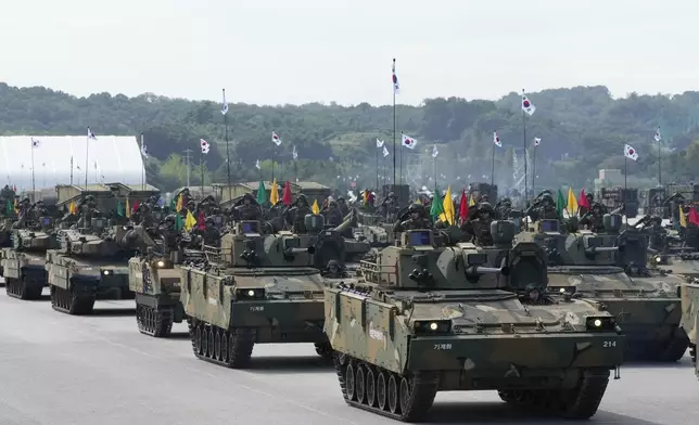 FILE - South Korean mechanized unit personnel parade with their armored vehicles during the media day for the 76th anniversary of Armed Forces Day at Seoul air base in Seongnam, South Korea, on Sept. 25, 2024. (AP Photo/Ahn Young-joon, File)