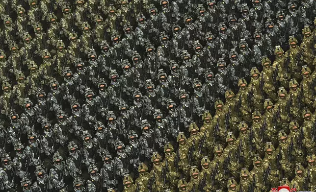FILE - In this photo provided by the North Korean government, soldiers march during a military parade to mark the 75th founding anniversary of the Korean People's Army on Kim Il Sung Square in Pyongyang, North Korea, on Feb. 8, 2023. Independent journalists were not given access to cover the event depicted in this image distributed by the North Korean government. The content of this image is as provided and cannot be independently verified. Korean language watermark on image as provided by source reads: "KCNA" which is the abbreviation for Korean Central News Agency. (Korean Central News Agency/Korea News Service via AP, File)