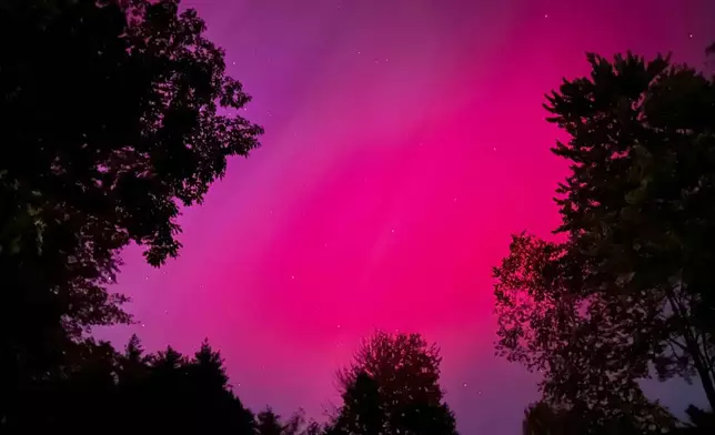 An aurora borealis, also known as the northern lights, is seen Thursday, Oct. 10, 2024, in Falmouth, Maine. (AP Photo/David Sharp)