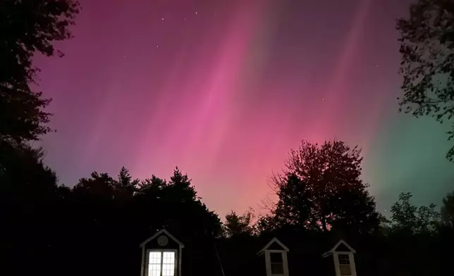 An aurora borealis, also known as the northern lights, is seen Thursday, Oct. 10, 2024, in Falmouth, Maine. (AP Photo/David Sharp)