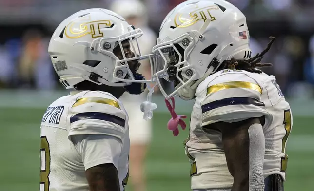 Georgia Tech running back Jamal Haynes, celebrates hios touchdown against Notre Dame during the first half of an NCAA college football game, Saturday, Oct. 19, 2024, in Atlanta. (AP Photo/Mike Stewart)