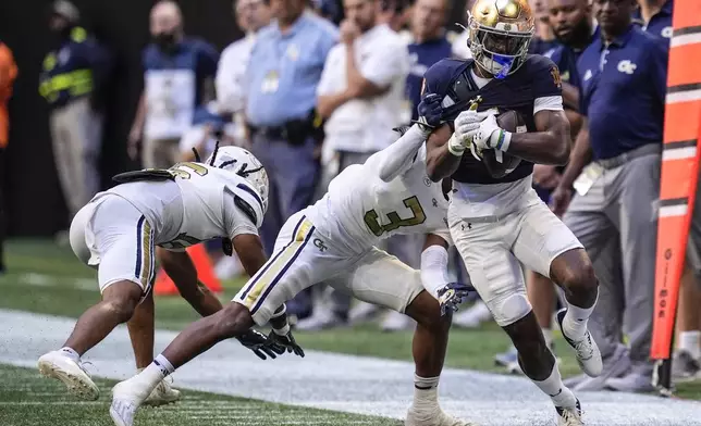 Notre Dame wide receiver Beaux Collins (5) runs against Georgia Tech during the first half of an NCAA college football game, Saturday, Oct. 19, 2024, in Atlanta. (AP Photo/Mike Stewart)