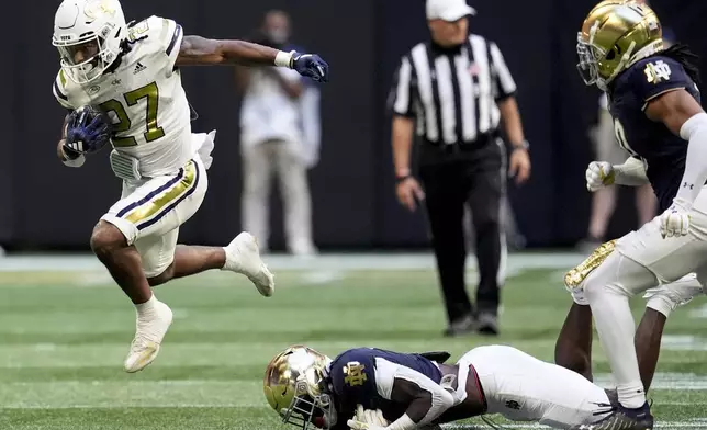 Georgia Tech running back Chad Alexander (27) runs against Notre Dame during the second half of an NCAA college football game, Saturday, Oct. 19, 2024, in Atlanta. (AP Photo/Mike Stewart)