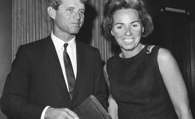 FILE - Sen. Robert Kennedy poses with his wife Ethel outside the Senate Chamber on Oct. 13, 1965, in Washington. (AP Photo, File)