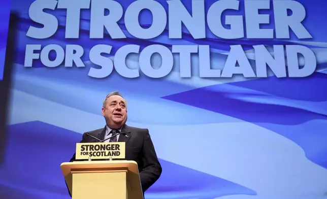 FILE - Alex Salmond speaks at the SNP conference in Glasgow on Oct. 14, 2016. (Jane Barlow/PA via AP)