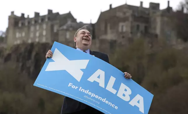 FILE - Alex Salmond stands at Stirling Castle to mark the start of the party's Mid Scotland and Fife campaign, ahead of the Scottish Parliamentary election on April 13, 2021 (Andrew Milligan/PA via AP)