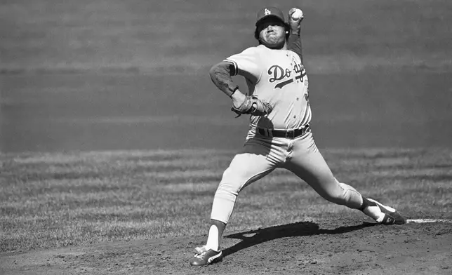 FILE - Los Angeles Dodgers pitcher Fernando Valenzuela pitches against a San Francisco Giants batter during the first inning at Candlestick Park, Oct. 3, 1982, in San Francisco. Fernando Valenzuela, the Mexican-born phenom for the Los Angeles Dodgers who inspired “Fernandomania” while winning the NL Cy Young Award and Rookie of the Year in 1981, has died Tuesday, Oct. 22, 2024. (AP Photo, File)