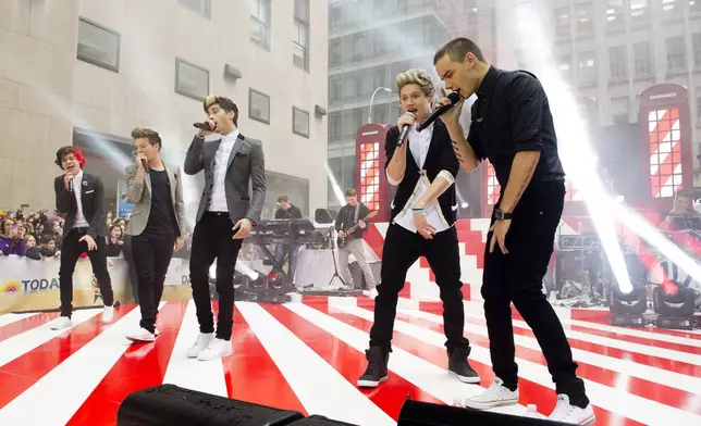 FILE - One Direction members, from left, Harry Styles, Louis Tomlinson, Zayn Malik, Niall Horan and Liam Payne perform on NBC's "Today" show, Nov. 13, 2012 in New York. (Photo by Charles Sykes/Invision/AP, File)