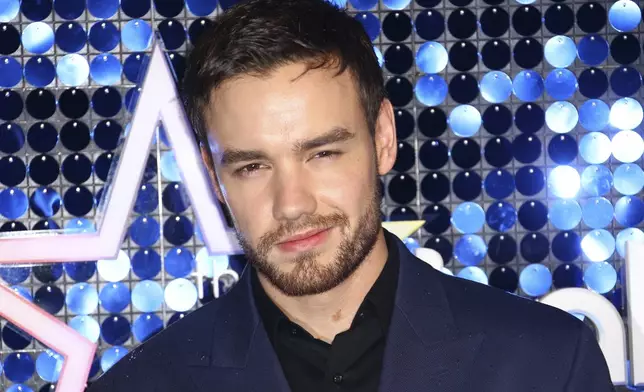 FILE - Singer Liam Payne poses for photographers upon arrival at the Global Gift Gala in London, March 7, 2019. (Photo by Joel C Ryan/Invision/AP, File)