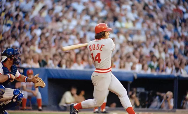 FILE - Pete Rose of the Cincinnati Reds in action at the bat against the Atlanta Braves in Atlanta, Aug. 2, 1978. At left is Atlanta catcher Joe Nolan. (AP Photo, File)