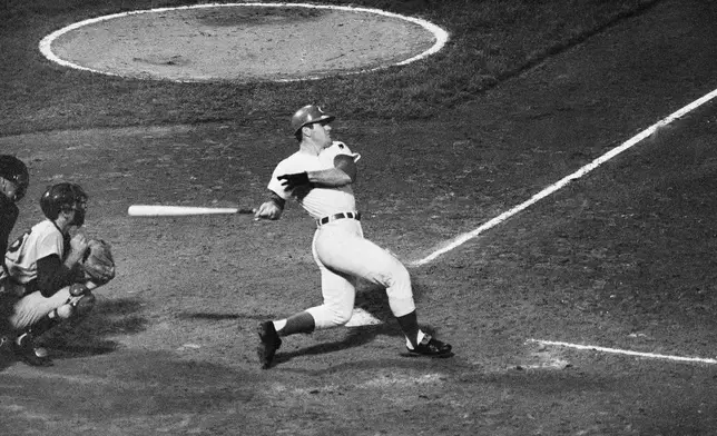 FILE - Cincinnati's Pete Rose watches the ball sail toward the right field bleachers in fourth inning of twi-nighter nightcap against the Dodgers in Cincinnati, Sept. 24, 1969. (AP Photo, File)