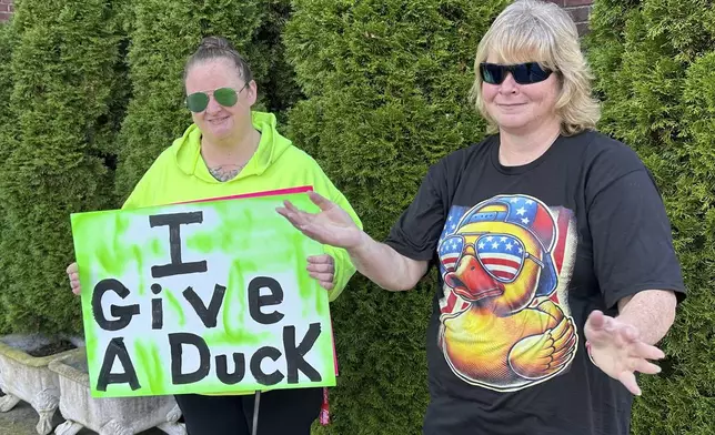 Supporters of Richard Schiffer Jr., who faces witness intimidation and other charges related to the Karen Read case, stand outside Stoughton District Court before Schiffer's arraignment, Wednesday, Oct. 23, 2024 in Stoughton, Mass. (AP Photo/Michael Casey)