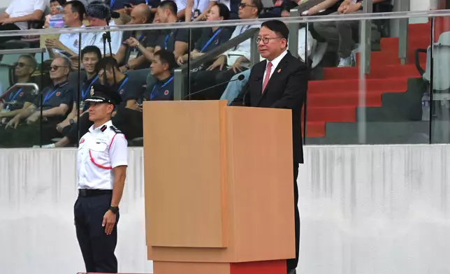 Security Bureau holds parade by disciplined services and youth groups and fun day in celebration of National Day  Source: HKSAR Government Press Releases