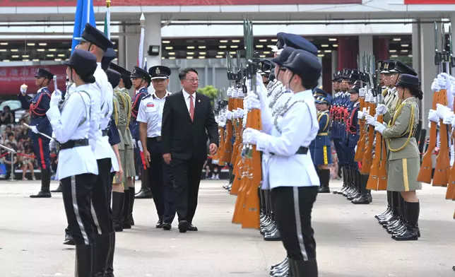 Security Bureau holds parade by disciplined services and youth groups and fun day in celebration of National Day  Source: HKSAR Government Press Releases