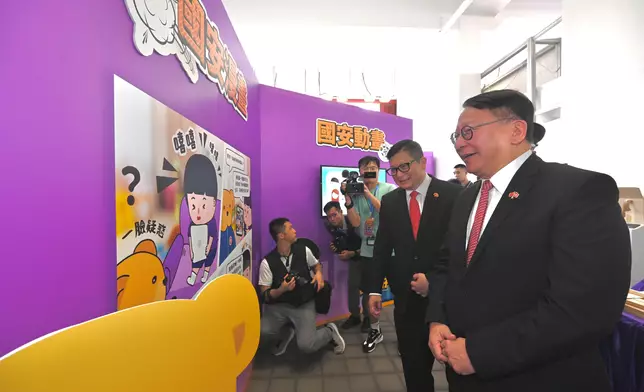 Security Bureau holds parade by disciplined services and youth groups and fun day in celebration of National Day  Source: HKSAR Government Press Releases