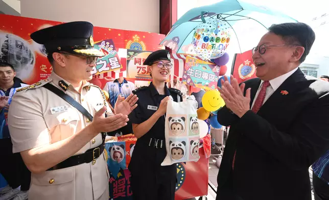 Security Bureau holds parade by disciplined services and youth groups and fun day in celebration of National Day  Source: HKSAR Government Press Releases