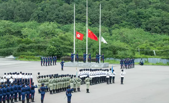 Security Bureau holds parade by disciplined services and youth groups and fun day in celebration of National Day  Source: HKSAR Government Press Releases
