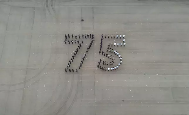 Security Bureau holds parade by disciplined services and youth groups and fun day in celebration of National Day  Source: HKSAR Government Press Releases