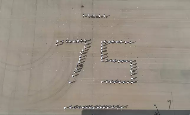 Security Bureau holds parade by disciplined services and youth groups and fun day in celebration of National Day  Source: HKSAR Government Press Releases