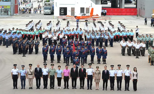 Security Bureau holds parade by disciplined services and youth groups and fun day in celebration of National Day  Source: HKSAR Government Press Releases