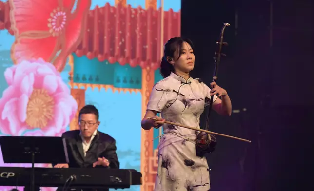 1 000 Mainland, Hong Kong and Macao youths in Chinese costumes gather to celebrate 75th anniversary of founding of People's Republic of China  Source: HKSAR Government Press Releases