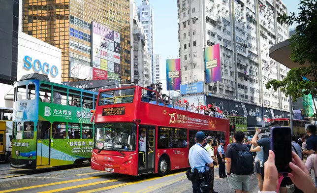 Bus parade and exhibition amid 75th National Day celebrations review important role of bus services in public transport system  Source: HKSAR Government Press Releases