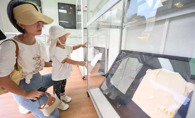 Bus parade and exhibition amid 75th National Day celebrations review important role of bus services in public transport system  Source: HKSAR Government Press Releases