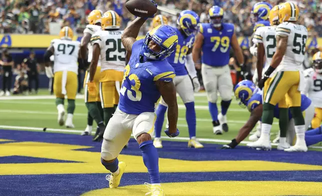 Los Angeles Rams running back Kyren Williams (23) celebrates his touchdown during the first half of an NFL football game against the Green Bay Packers Sunday, Oct. 6, 2024, in Inglewood, Calif. (AP Photo/Ryan Sun)