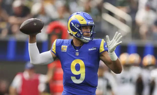 Los Angeles Rams quarterback Matthew Stafford (9) throws a pass during the first half of an NFL football game against the Green Bay Packers Sunday, Oct. 6, 2024, in Inglewood, Calif. (AP Photo/Ryan Sun)