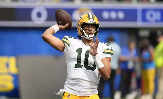 Green Bay Packers quarterback Jordan Love (10) throws a pass against the Los Angeles Rams during the first half of an NFL football game Sunday, Oct. 6, 2024, in Inglewood, Calif. (AP Photo/Gregory Bull)