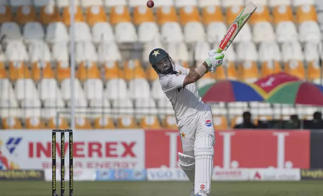 Pakistan's Mohammad Rizwan plays a shot during the third day of the second test cricket match between Pakistan and England, in Multan, Pakistan, Thursday, Oct. 17, 2024. (AP Photo/K.M. Chaudary)