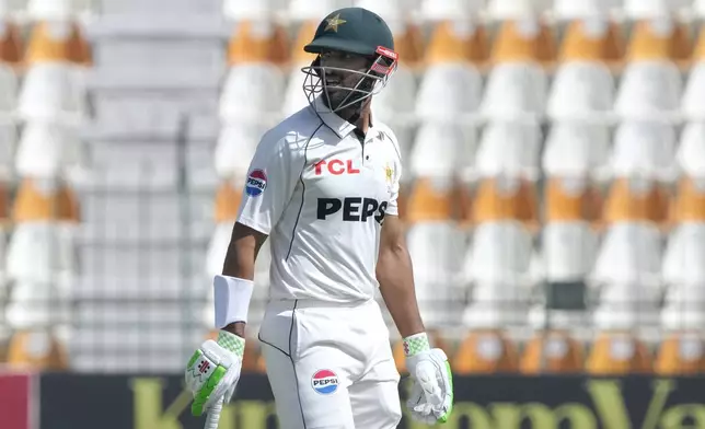 Pakistan's Shan Masood reacts as he walks off the the field after his dismissal during the first day of the second test cricket match between Pakistan and England, in Multan, Pakistan, Tuesday, Oct. 15, 2024. (AP Photo/K.M. Chaudary)