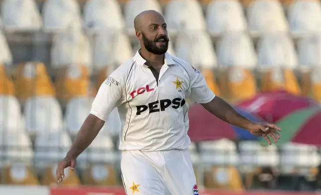 Pakistan's Sajid Khan celebrates after taking the wicket of England's Ben Duckett during the third day of the second test cricket match between Pakistan and England, in Multan, Pakistan, Thursday, Oct. 17, 2024. (AP Photo/K.M. Chaudary)