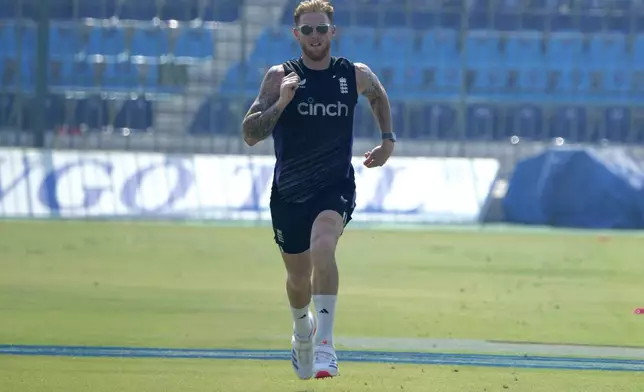 England's Ben Stokes runs during a practice session, in Multan, Pakistan, Monday, Oct. 14, 2024. (AP Photo/K.M. Chaudary)